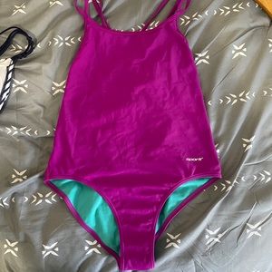 Strappy one piece swim suit